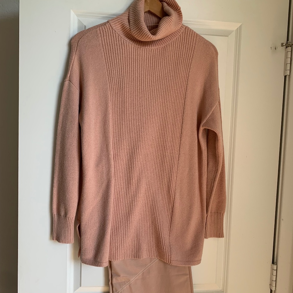 Salmon colored sweater and matching pants.